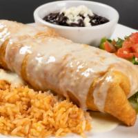 Chimichangas · A crispy flour tortilla stuffed with your favorite filling, then topped with queso. Garnishe...