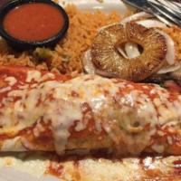 Chipotle · Tender pork in spicy chipotle sauce and topped with cheese. Served with rice, grilled onions...