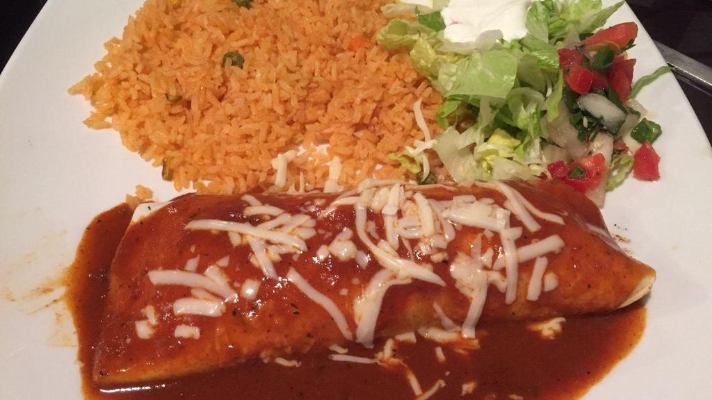 Chicken Mole · Filled with grilled chicken, topped with mole and queso. Served with rice and pico de gallo.