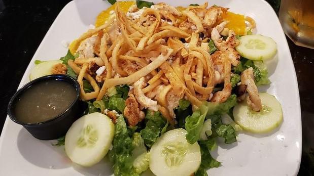 Mexican · Choice of crispy or grilled chicken, romaine lettuce, diced orange, cucumber, crispy tortilla strips and queso fresco.