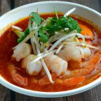Tom Yum · Spicy. Thai hot and sour soup. Choice of noodle, ground pork, roasted red pork, egg, ground ...