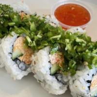 Stingray Roll · Spicy crab roll, topped cilantro/jalapeño mix, sweet chili sauce.