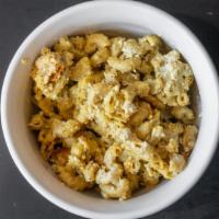 Baked Mac & Cheese · Wheat elbow noodles in vegan cheese. (contains soy).