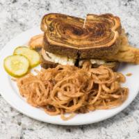 Walleye Reuben · Muddy's favorite. Deep-fried or grilled walleye with Swiss, slaw, and thousand island on mar...