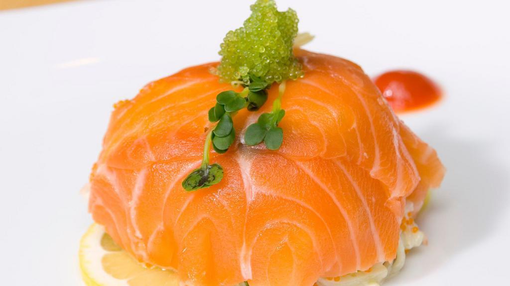 Salmon Avocado Salad · avocado mixed with crab stick, cucumber and frying fish roe wrapped inside layers of raw salmon.
