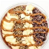 Patterson Bowl · Base: acai, banana, almond butter, cacao plant-based protein, maca, almond milk. Toppings: b...