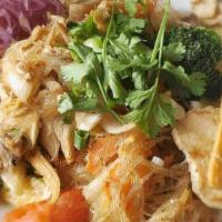 Pad Woonsen · Stir-fried glass noodle with your choice of meat, egg, celery, baby corn, carrot, zucchini, ...