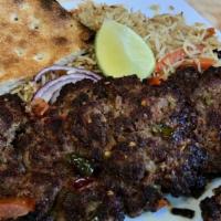 Beef Chapli Kabob · Ground beef patty seasoned with hot peppers, onions, tomatoes, and spices. Served with Afgha...