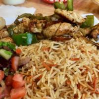 Chicken Gyro Platter · Chicken gyro cooked with onions, sweet peppers and served with Afghan rice and chopped salad...