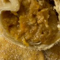 Sweet Potato Eggroll · House made sweet potato pie filling rolled in cinnamon and sugar.