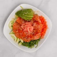 Salmon Sashimi Poke Bowl · Edamame, avocado, cucumber, carrot, lettuce, sesame, seaweed salad and tobiko.
