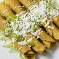 Chicken Flautas  · 3 fried tacos filled with shredded chicken, sour cream, lettuce, pico de Gallo and guacamole...