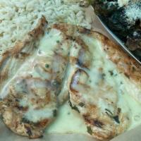 Chicken Breast · Grilled chicken breast accompanied with your choice of sauce/seasoning with two house sides.