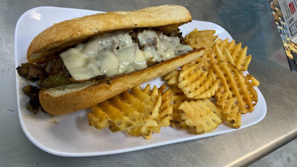 Beef Philly · Sliced beef, peppers and onion blend, mushrooms, and Swiss cheese on a hoagie bun. Served with au jus.