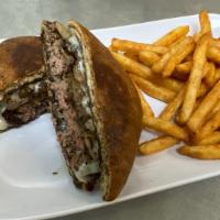 Patty Melt · Sautéed thyme mushrooms and onions with Swiss cheese served on marble rye.