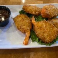 Coconut Shrimp · Coconut butterfly shrimp served with a sweet chili dipping sauce.