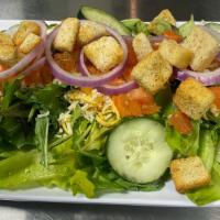 House Salad · Lettuce, grape tomato, cucumber, red onion, shredded cheese, and croutons. Add chicken or st...