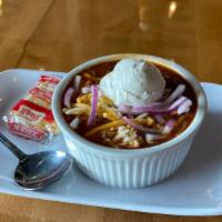 House Made Chili · Our house-made chili topped with shredded cheese and sour cream.