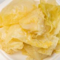 Cabbage · Juicy and delicious cooked cabbage.  Great with BBQ, or any main dish at Levi’s!