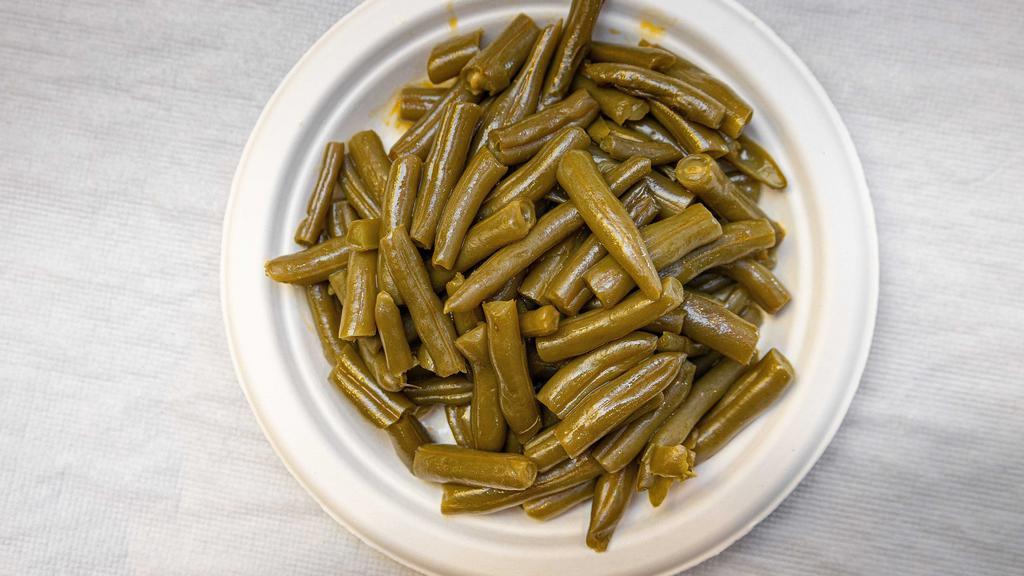 String Beans · Tender green beans, cooked and seasoned to perfection.