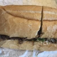 Steak & Cheese · Ribeye steak, lettuce, tomato, grilled onions, mushroom, and green pepper with provolone che...