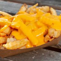 Cheese Fries · Crinkle cut fries served with Cheddar cheese sauce.