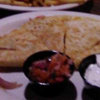 Chicken Quesadilla · Diced Chicken, Onions, Peppers, Cheese, Served with Pico De Gallo & Sour Cream.