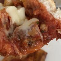 Meatball Parmigiana Sandwich · Lettuce, tomatoes and own special Italian dressing.