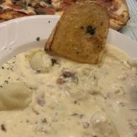 Homemade Ravioli Pasta · Choice beef or cheese stuffed ravioli. Served with garlic bread. Add extra for an additional...
