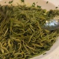 Angel Hair Al Pesto Pasta · Angel hair pasta sautéed in a basil, garlic, and olive oil sauce. Served with garlic bread. ...