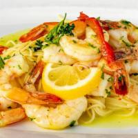 Shrimp Scampi · Colossal shrimp sautéed and seasoned in a garlic lemon sauce on top of a bed of angel hair p...