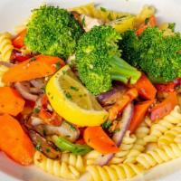 Piccata Chicken Primavera · Boneless breast of chicken sautéed with broccoli, carrots, red and green bell peppers, purpl...