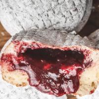 Mixed Berry Jam · 24 hr brioche tossed in powdered sugar + filled with a fresh mixed berry jam.