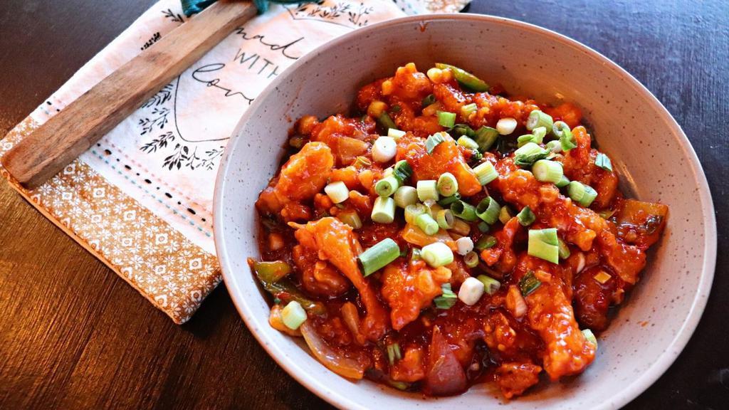 Chili Chicken · Seasoned fried chicken tossed in a soy chili sauce.