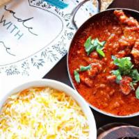 Chicken Vindaloo · Famous Goan dish first introduced by Portuguese sailors. chicken thigh pieces simmered in a ...