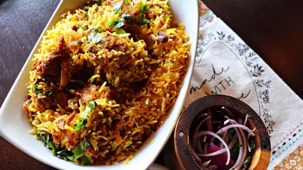 Chicken Biryani · A medley of aromatic basmati rice, layered with herbs & roasted spices and slow cooked until beautifully fragrant.