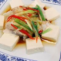 Steamed Fish W/ Tofu 豆腐鱼 · Soft tofu, basa fish fillet, green onions, NOT spicy, serve with steamed white rice
