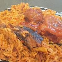 Jollof Rice + Fish · Mild spicy nigerian jollof rice cooked with bell peppers,tomatoes,bay leaf and some spices