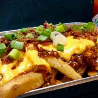 Cheesy Chili Fries · NJ Boardwalk Fries loaded up with House Chili,  Cheesy Sauce, Bacon Crumble, Smoked-Out Aoli...