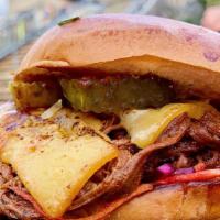 Smoked Brisket Burger · Overnight smoked brisket (lean flat) piled with applewood smoked bacon, crispy fried onions,...