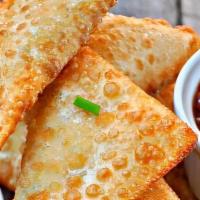 Crab Rangoon Appetizer · Daily homemade crab wontons with French herb cheese.
