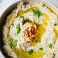Baba Ganoush Daddy · Cold dip which is a blend of fresh roasted eggplants tahini sauces complemented by chef’s sp...
