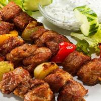 Kefta Kebab Plate Carnage · Our juicy ground beef is tossed in a delicious amalgamate of Mediterranean spices. Served wi...