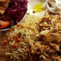 Shawarma Chicken Plate Carnage · Our well-marinated chicken cooked on a vertical chicken rotisserie is shredded to create a d...