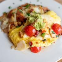 California Club Omelet · roasted turkey / bacon / provolone / spinach / tomato / guacamole / home fries