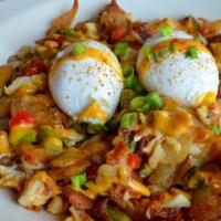 Crab Hash · lump crabmeat / home fries / bacon / fried eggs / asparagus / roasted red pepper / chipotle ...
