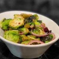Spicy Brussels Sprouts · Vegetarian, spicy. Brussels sprouts, Mediterranean olives, and onions.