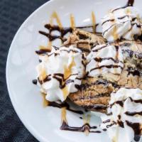 Sticky Cookie · Double chocolate chunk cookie,. old fashioned vanilla ice cream, whipped cream, chocolate, c...