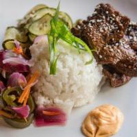 Gf  Bulgogi Beef  Bowl · Steamed jasmine rice, Korean marinated beef, cucumber-ginger slaw, pickled vegetables, gochu...