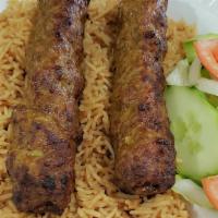 Chicken Seekh Kabob · Ground sirloin and granted onion with seasoning cooked on skewers w/ house seasoning